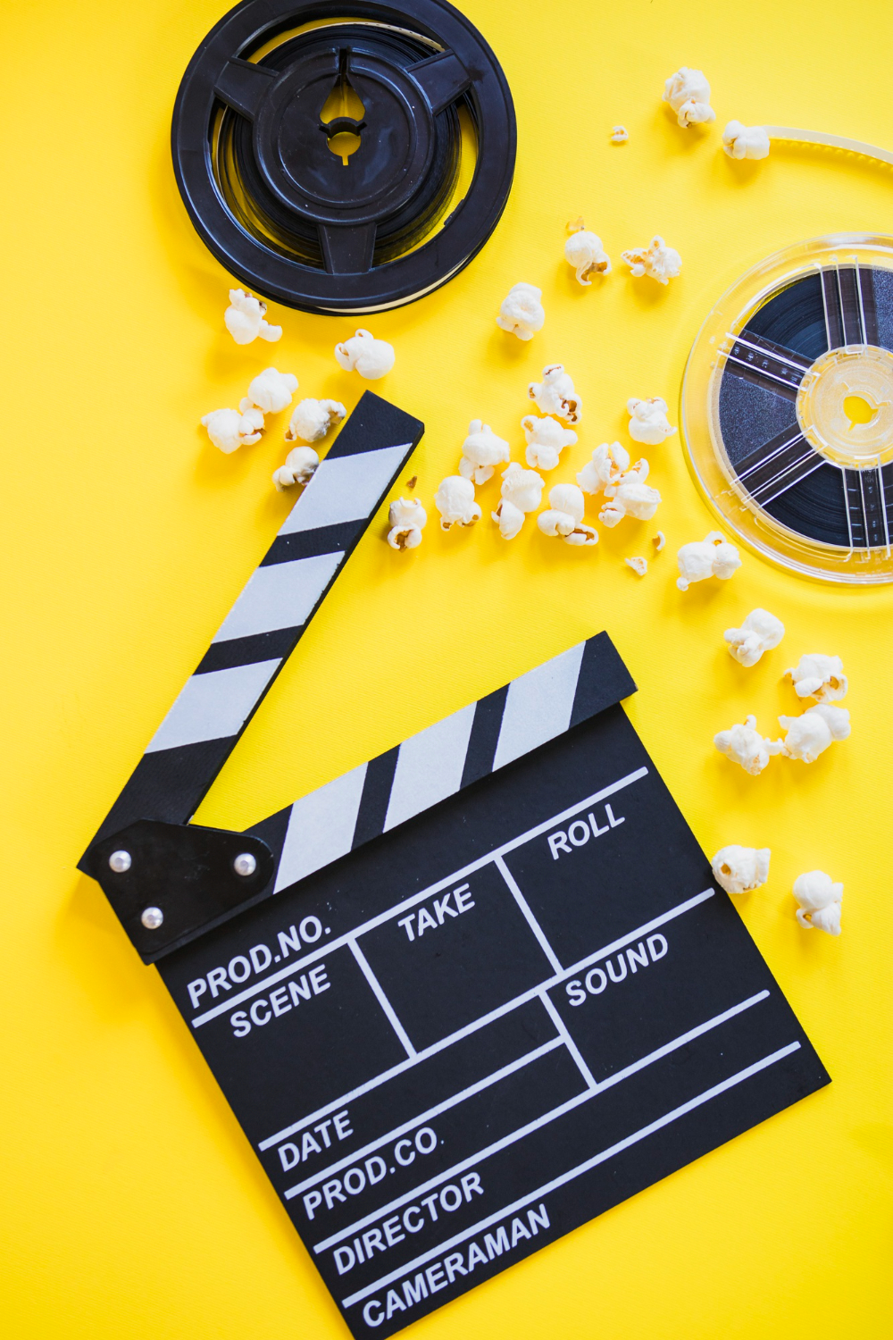 clapperboard-with-popcorn-reels